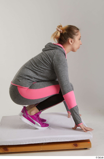  Mia Brown  1 dressed grey hoodie grey leggings kneeling pink sneakers sports whole body 0007.jpg